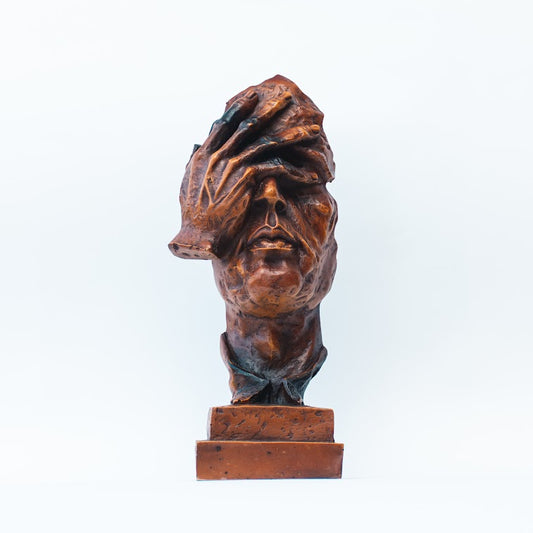 Male Face Figurine