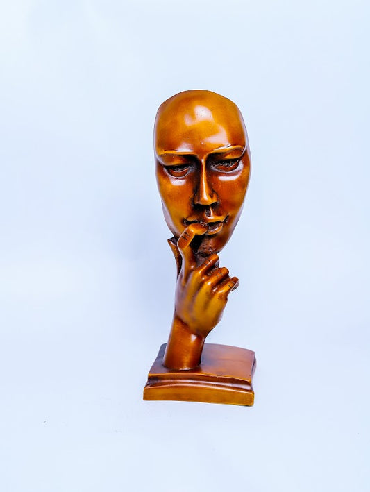 Male Face Figurine.